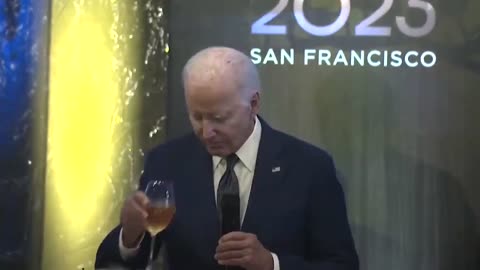 Biden Fakes Sipping A Glass Of Wine In Bizarre Moment