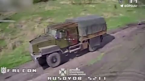 Border guards' FPV drone hit enemy armored truck in Kharkiv direction