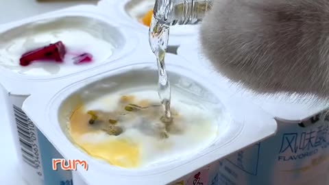 Kitten preparing ice cream