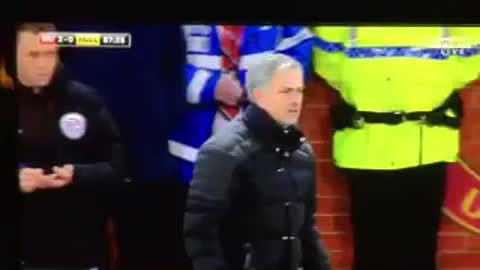 Marouane Fellaini celebrates his goal with Jose Mourinho.