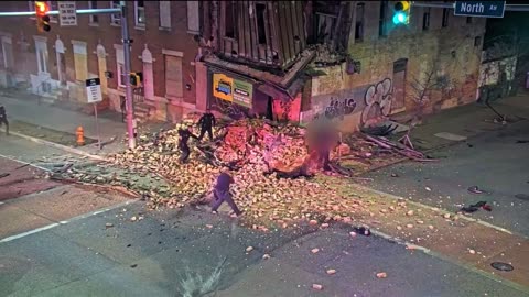 Fatal crash in Baltimore MD Car runs red light, crashes into building, building collapses No sound