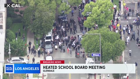 Helicopter angle of Parents and Muslims both fighting AntiFa protecting Pride Grooming at Schools