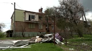Chernihiv residents clear debris of destroyed homes