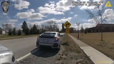 State trooper nearly hit by suspected distracted driver