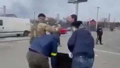 What's up with Zelensky's thugs terrorizing their own citizens by strapping them to street signs