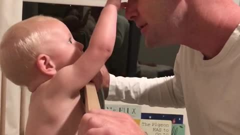 Baby's Jaw Hits the Floor After Dad Shaves Off Beard