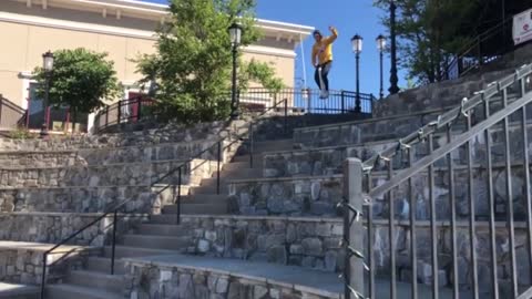 Teenager Jumping Down The Stairs On A Pogo Stick, Falls Right On His Butt