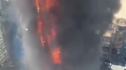 SCENE: Fire engulfs skyscraper in Tianjin, China; firefighters battling