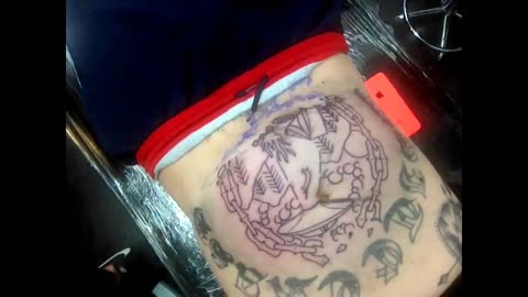 Painful stomach tattoo