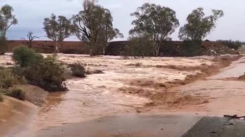Wonoka Creek overflowing onto the Flinders Rangers Way in Hawker, South Australia