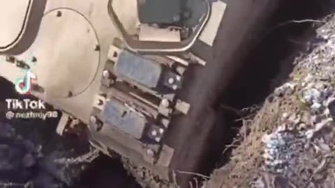 Ukraine solider shows American military vehicle stuck