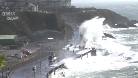 Storm Kathleen waves wash over cars on Isle of Man