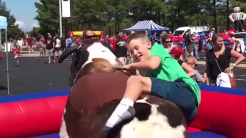Funny Mechanical Bull Fails - Better hold on tight!