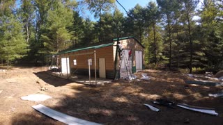 Time lapse assembling a metal pole barn.