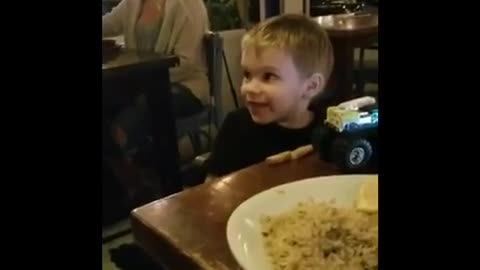 Toddler has the sweetest reaction to a belly dancer.