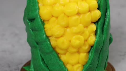 Shape the cake into a cute corn shape