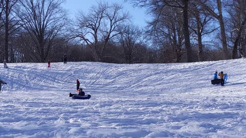 Snow Tubing Sledding Fail Mom slides into boy