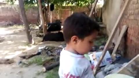 Small Little boy Playing with Pots