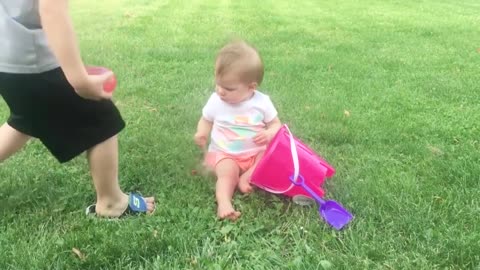 Funny baby Playing with water-Baby outdoor video
