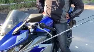 Powerlines Fall Around Motorcyclist