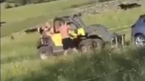 Driver has blocked farm gate with his car. farm owner uses tractor