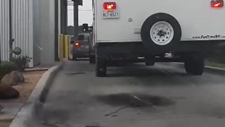 Camper Trailer Takes out Roof in Drive-Thru