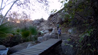 Overly Cautious Kid Crosses Small Bridge As If It Was Niagra Falls