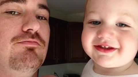 Dad teaches baby boy how to beatbox