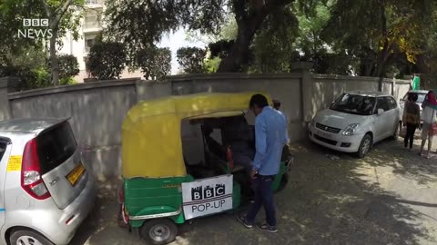 rickshaw across Delhi