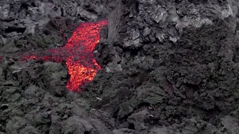 Third lava stream cracks in Icelandic volcano