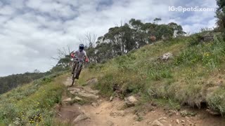 Guy orange gloves dirt bike fall