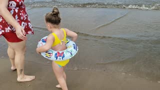 My Daughter scared of the ocean waves