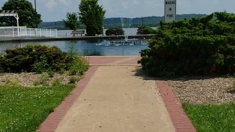 Walking by water fountain