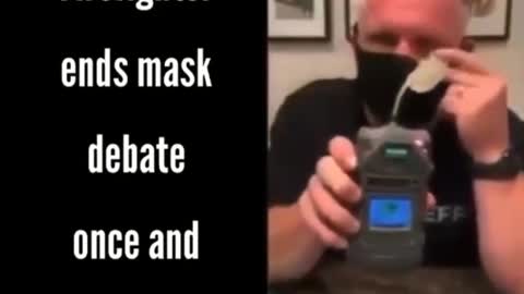 Firefighter demonstrates oxygen-deprevation using face masks