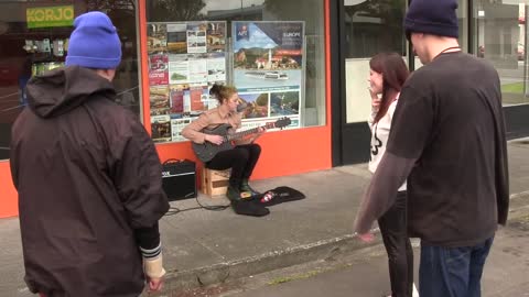 Girl Busker gets her guitar broken