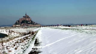 France's Mont Saint-Michel is covered in snow