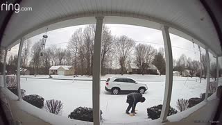 Man Slips Down Icy Front Porch Steps