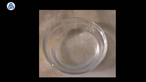 adding a tiny piece of Sodium metal to plain water