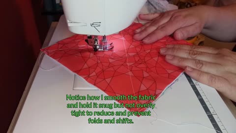 Sewing the X on a rag quilt sandwich