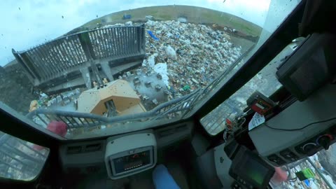 Ride On a Trash Compacor