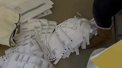 The second video: someone finds in a bag marked “spoiled ballots”