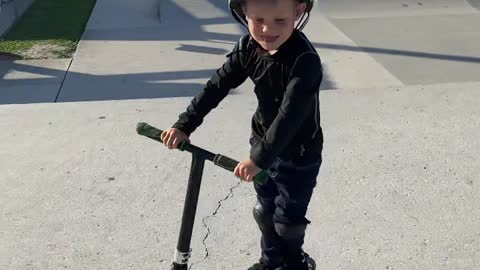 Young Scooter Rider Lands Tail Whip