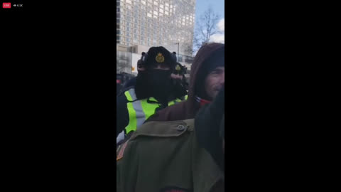 Trudeau's brownshirts pushing people from the Freedom Convoy protest site (video from 02/18/2022)