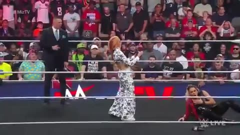Becky Lynch uses Trish Stratus' face mask to headbutt Zoey Stark