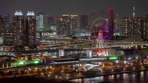 Tokyo iluminated cityscape and fast traffic