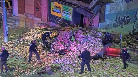 Baltimore car crash crumbles building