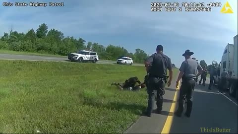 Ohio State Highway Patrol body-cam video shows a police dog attacking a man whose hands are raised