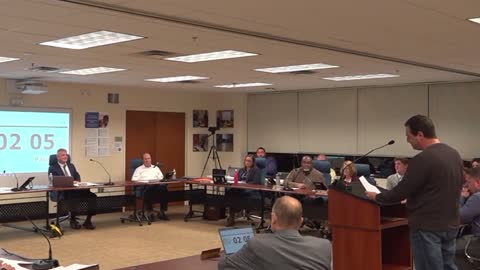 A man confronts a school board in West Chester, PA