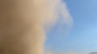 Fire Fighter Camp Engulfed by Huge Dust Devil