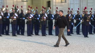 Macron greets Zelensky in Paris